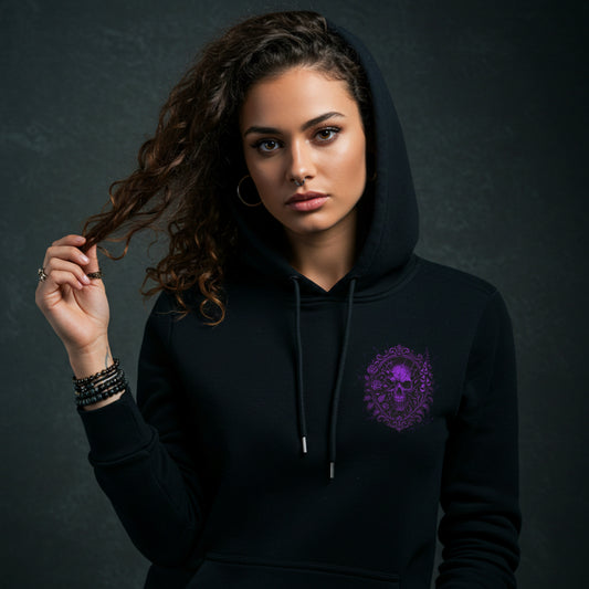 Woman wearing a black hoodie with a purple logo on a dark background